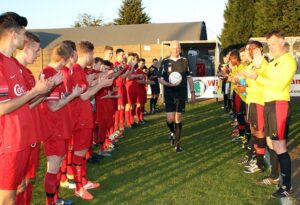 keith-chamberlin-receives-a-guard-of-honour-from-both-teams