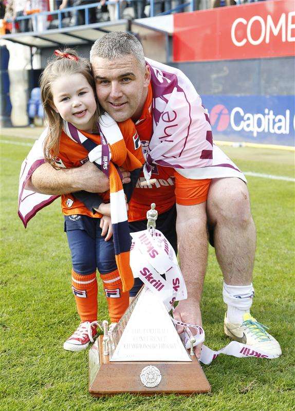 Steve McNulty celebrates the Conference title with daughter