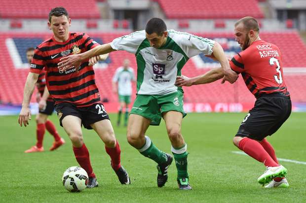 Connor Jennings, left, in action for Wrexham