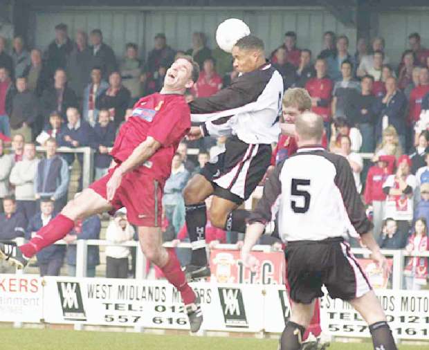 Ashley Williams in action for Hednesford against Tamworth