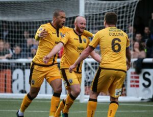 sufc0724-suttons-jamie-collins-ross-lafayette-celebrate-with-davis