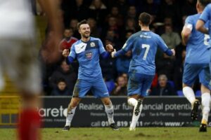 county-celebrate-matty-warburtons-goal_scfc-2-0-ycfc_270118-002-3