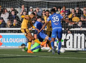 sufc0742-suttons-terell-thomas-strikes-from-close-range-to-open-the-scoring-for-the-us-paul-loughlin-sutton-v-guisley