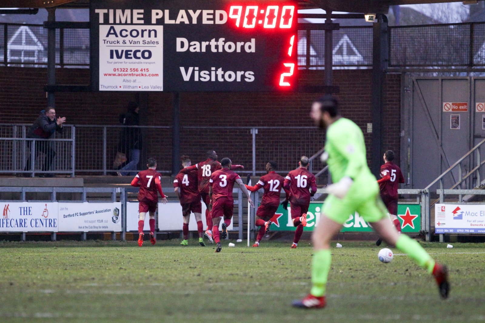 taylor-miles-of-chelmsford-is-congratulated-after-scoring-direct-from-a-corner-to-make-it-2-1-against-dartford
