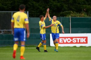 tony-gray-of-warrington-town-right-celebrates-after-opening-the-scoring-1-0