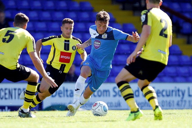 ben-mckenna-on-the-ball-for-county_stockport-2-2-harrogate_120817-001