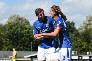 joe-partington-is-congratulated-by-connor-essam-of-eastleigh-after-scoring-their-second-goal-eastleigh-v-guiseley-2