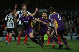 aaron-downes-celebrates-his-goal-during-the-vanarama-national-league-match-between-grimsby-town-fc-and-cheltenham-town-at-blundell-park-grimsby