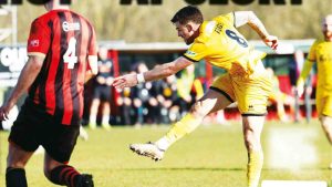 Aldershot Town secured a 3-0 victory over Sittingbourne in the FA Trophy quarter-final