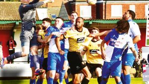 PUNCH: Hornchurch’s Mason Terry clears. PICTURE: Steve Terrell