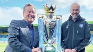 ALL SMILES: Jeff Stelling with Non-League Day founder James Doe at Eastleigh last season PICTURE: Prostate Cancer UK