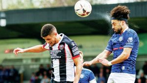 EFFORT: Tarryn Allarakhia heads goalwards for Rochdale PICTURE: Darren Woolley