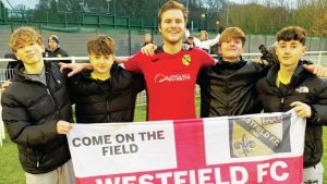 LOYAL SUPPORTERS: Westfield fans Will, Oscar, Matt and Sam with keeper Lewis Gallifent