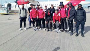 JUST LANDED: The Southall FC squad touch down at Guernsey Airport