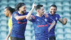 WISE HEAD: Rochdale ace Ian Henderson celebrates scoring against Wealdstone PICTURE: Dan Youngs