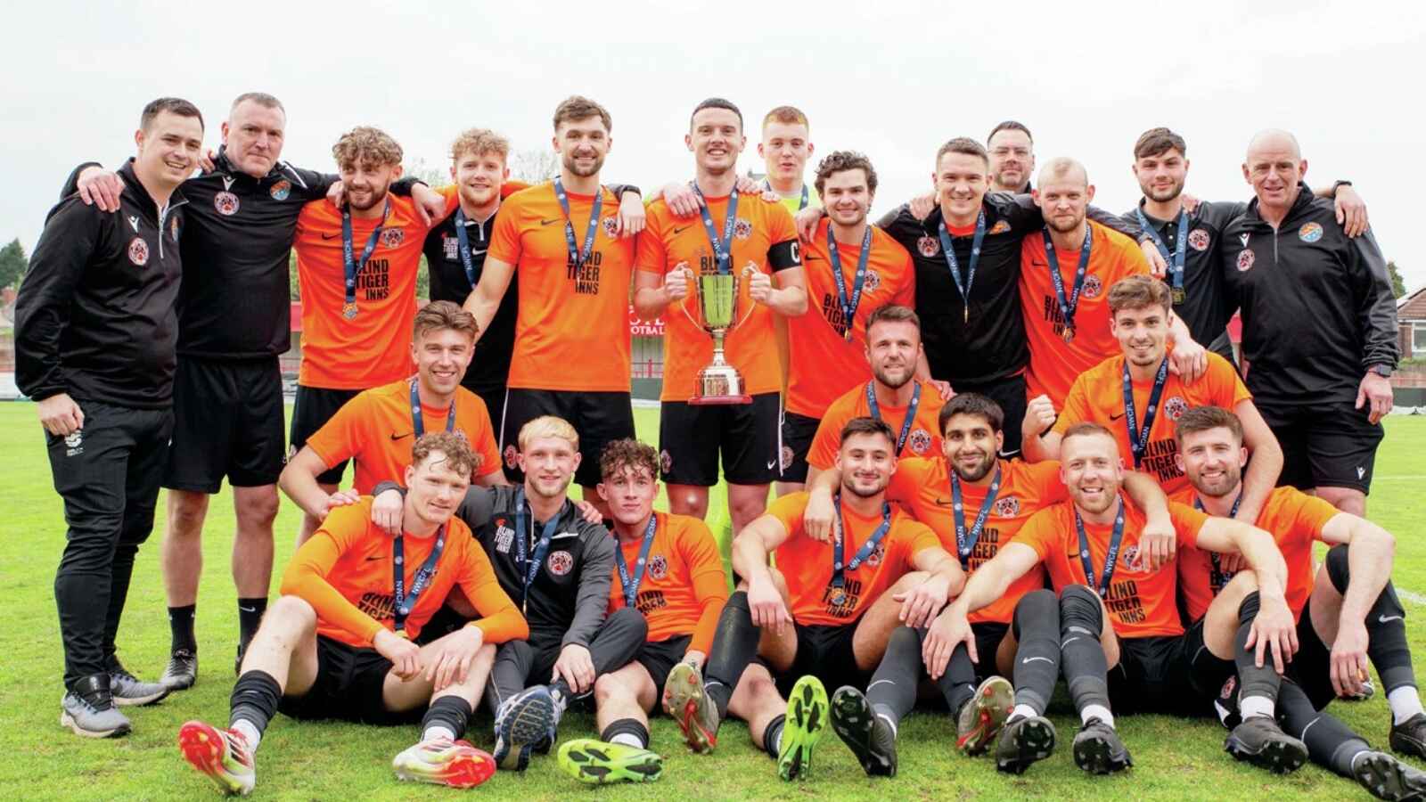GLORY: Euxton Villa celebrate promotion PICTURE: Callum Pilkington