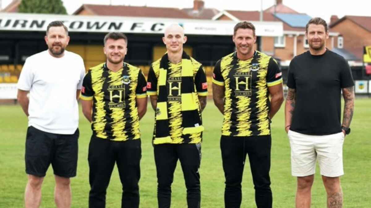 TREBLE TOPS: Hebburn Town boss Daniel Moore, right, parades his three new signings PICTURE: Tyler Lopes