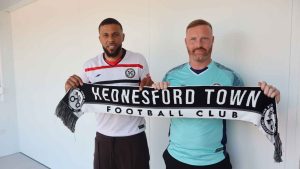 Hednesford Town boss Gavin Hurren with his latest recruit Jonny Edwards PICTURE: Hednesford Town FC