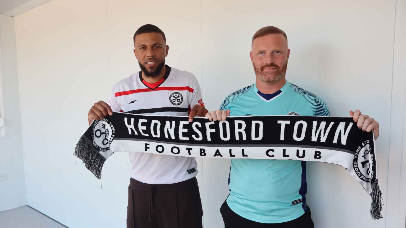 Hednesford Town boss Gavin Hurren with his latest recruit Jonny Edwards PICTURE: Hednesford Town FC