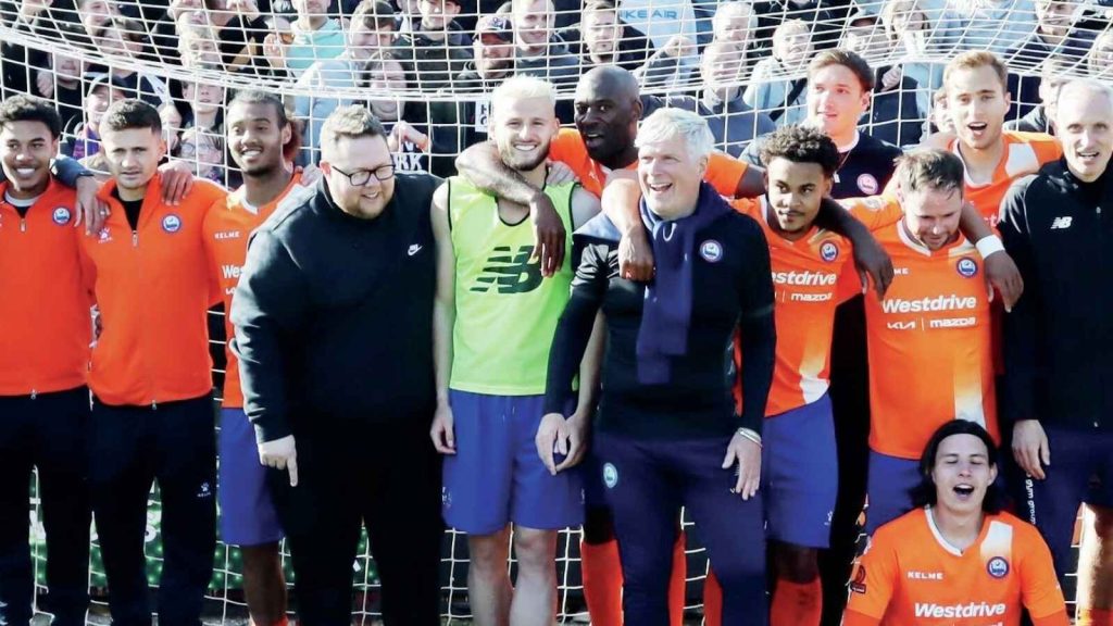WE’RE ON THE UP: Steve Pitt with the promotion-winning Braintree side. PICTURES: Jon Weaver
