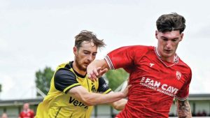 WARMING UP: Morecambe’s Harvey Macadam, right, in action in yesterday’s friendly at AFC Fylde PICTURE: Adam Gee