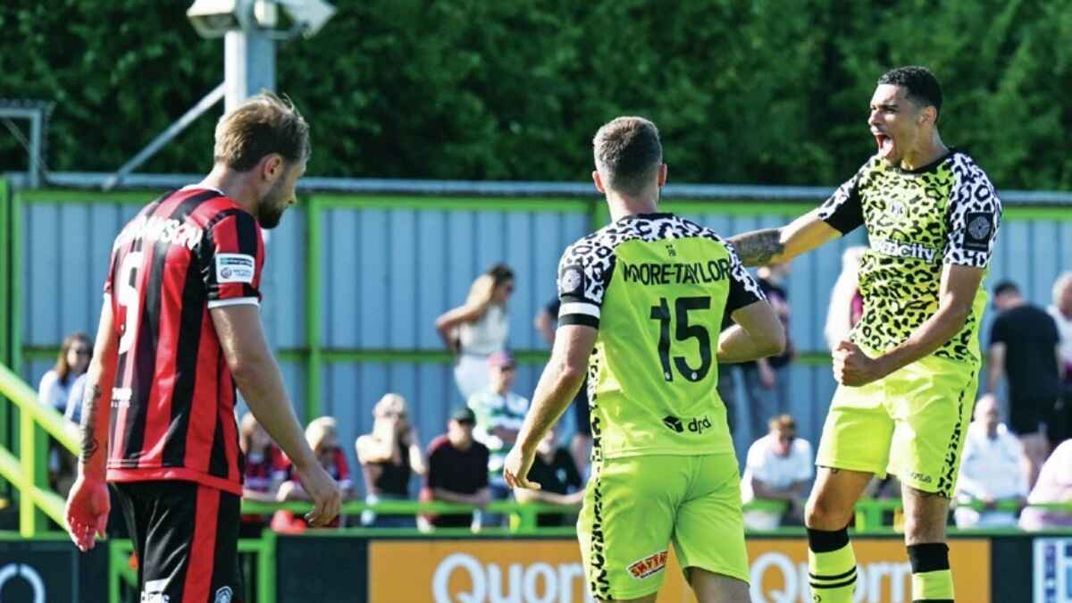 UP AND AT ‘EM: Kairo Mitchell enjoys his first goal for Forest Green PICTURE: Pro Sports