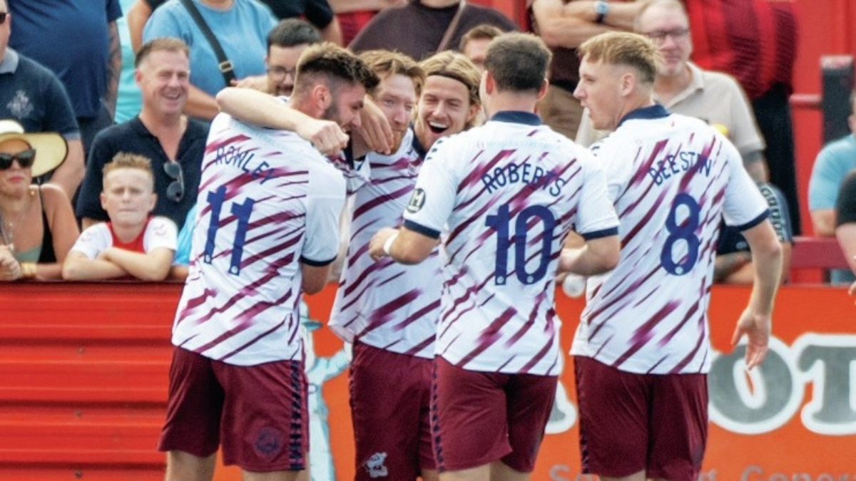 FAST START: Scunthorpe celebrate their opening goal PICTURE: Luke Davies