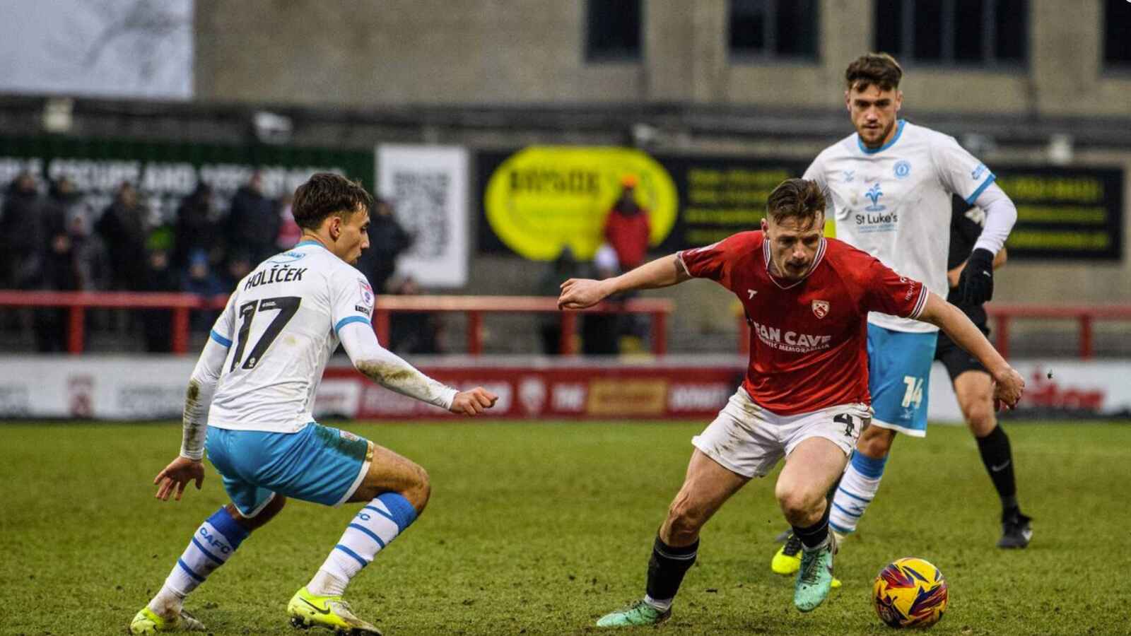 EXIT: Tom White on the ball for Morecambe PICTURE: Alamy