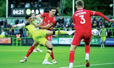 Forest Green Rovers forward Kairo Mitchell fires in