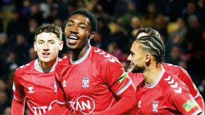 York City celebrate Malcahi Fagan-Walcott’s goal against Carlisle