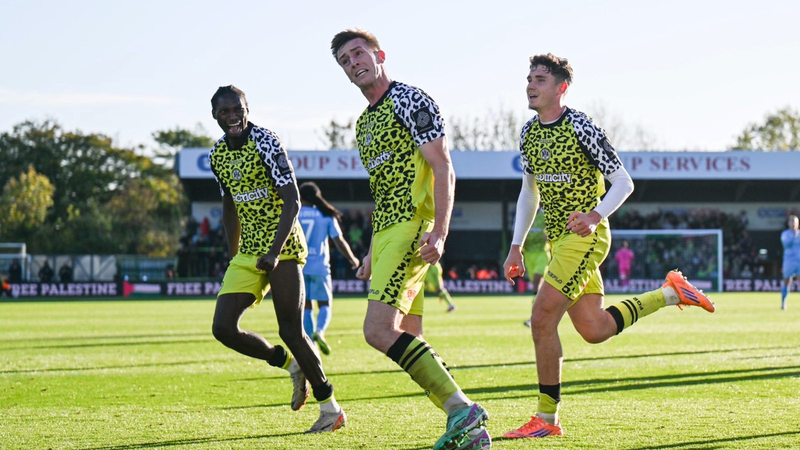 Harvey Bunker wheels away in celebration after converting the decisive penalty to give Robbie Savage’s Forest Green Rovers all three points