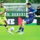 Forest Green’s James Balagizi, left, gets to the ball before Rochdale’s Connor McBride