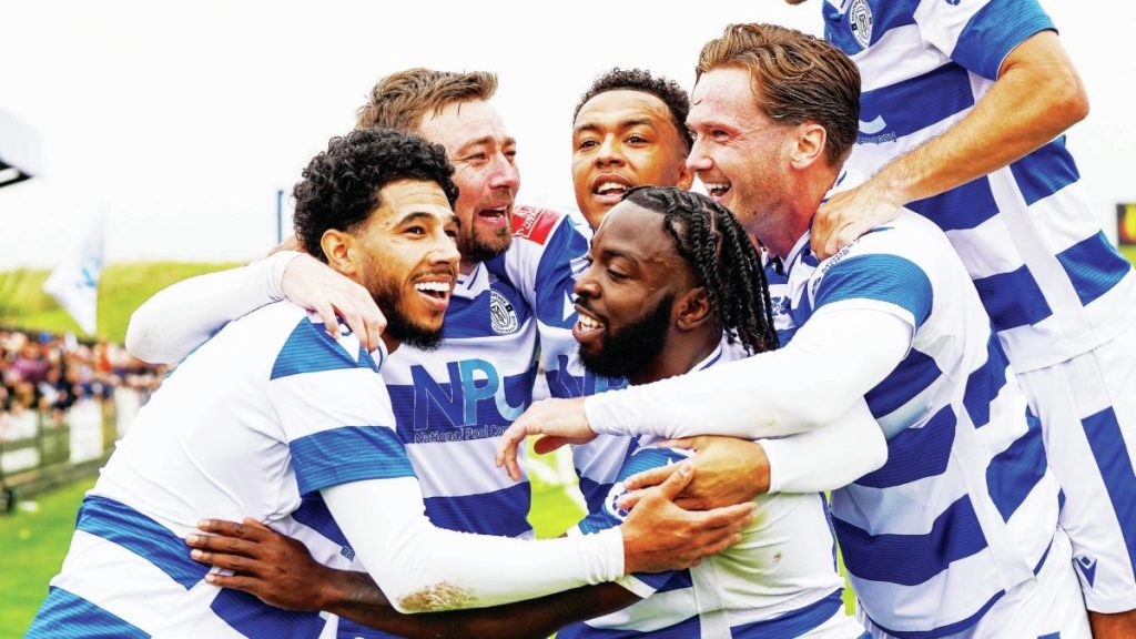 Freddie Sears is surrounded by team-mates after scoring Maldon & Tiptree’s winner