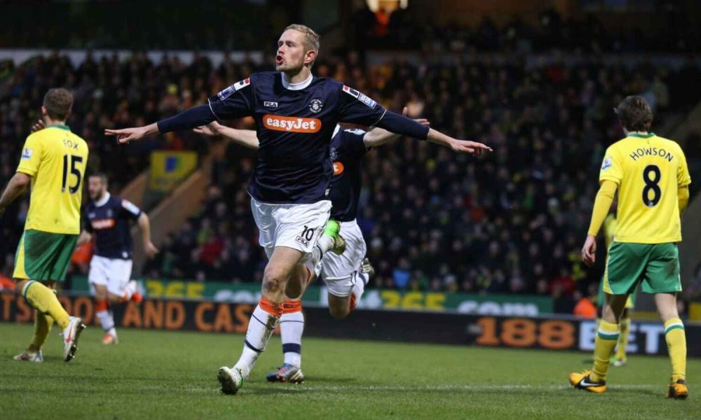 Scott Rendell wheels away after scoring for Luton Town in 2013