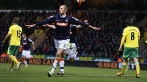 Scott Rendell wheels away after scoring for Luton Town in 2013