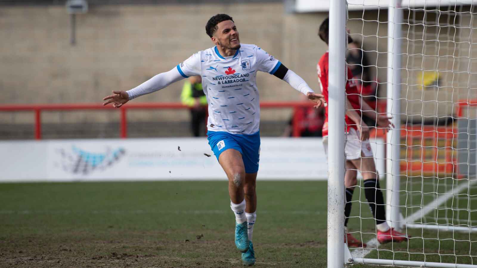 Rochdale’s Tyler Smith in action for Barrow last season