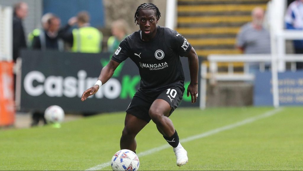 Abdul Abdulmalik’s wonder goal secured another victory for high-flying Boreham Wood