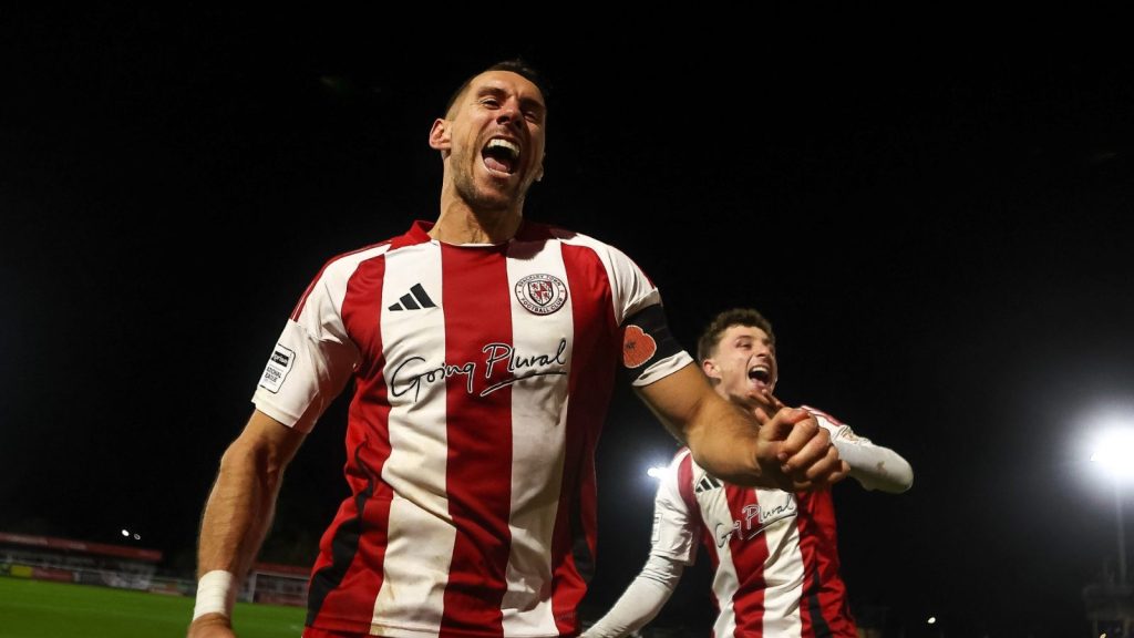 Brackley Town’s Matt Lowe leads the celebrations after their win over Notts County