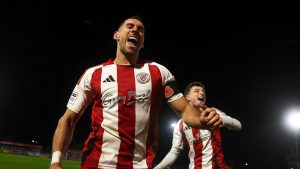 Brackley Town’s Matt Lowe leads the celebrations after their win over Notts County