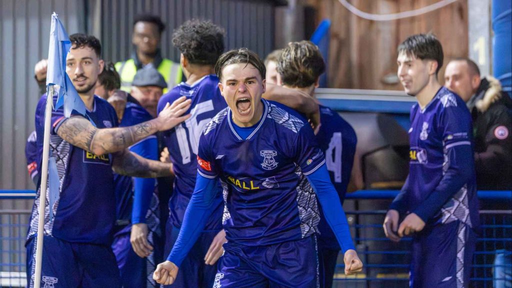 Callum Leigh celebrates the only goal between Leek Town and Scarborough Athletic as the Blues progress to the next round