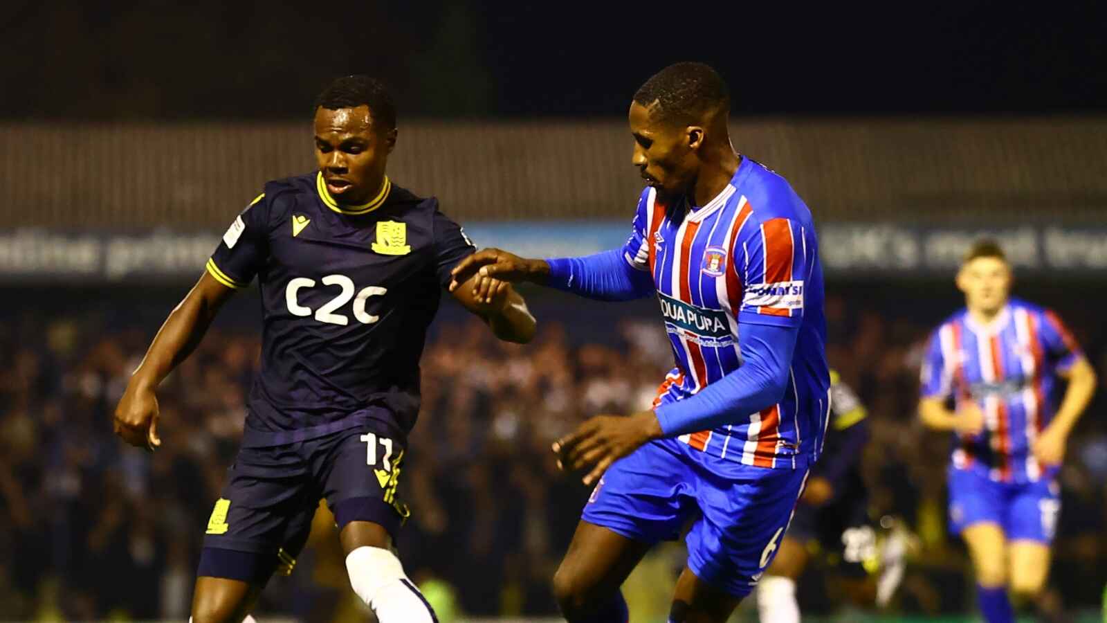 Southend United’s Josh Walker, left, battles Carlisle United’s Aaron Hayden