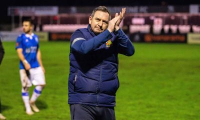 Former Wealdstone manager Neil Gibson shows his appreciation for the fans