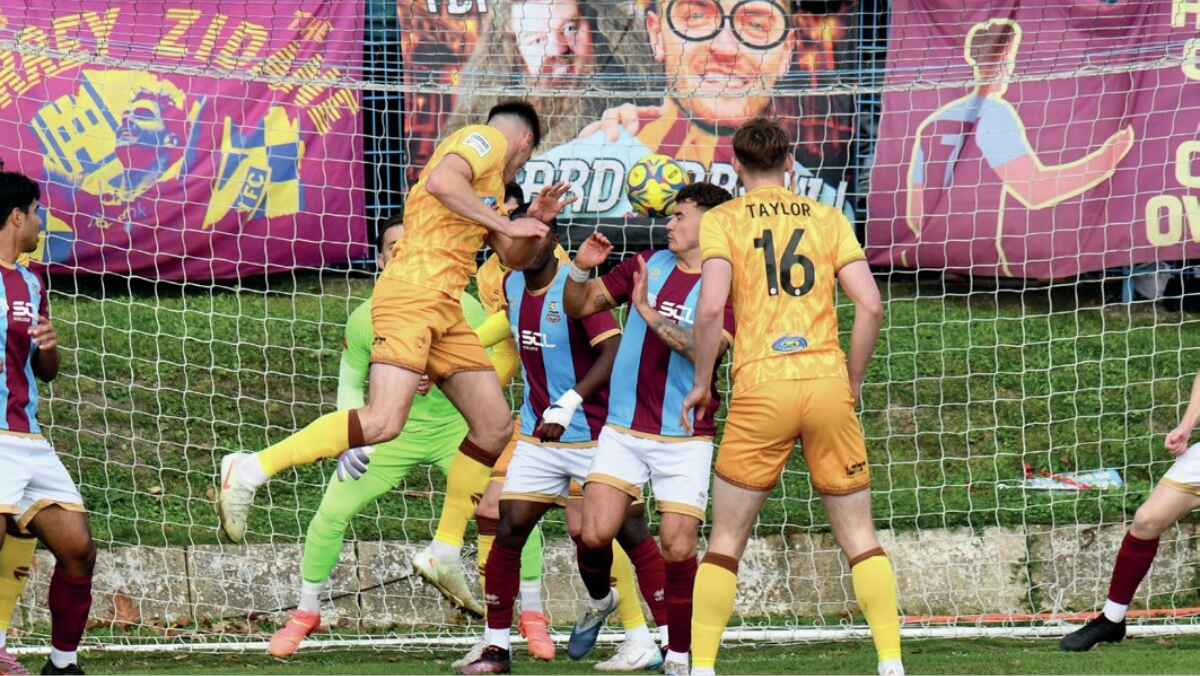 Sutton United’s Harry Phipps scores against Farnham Town