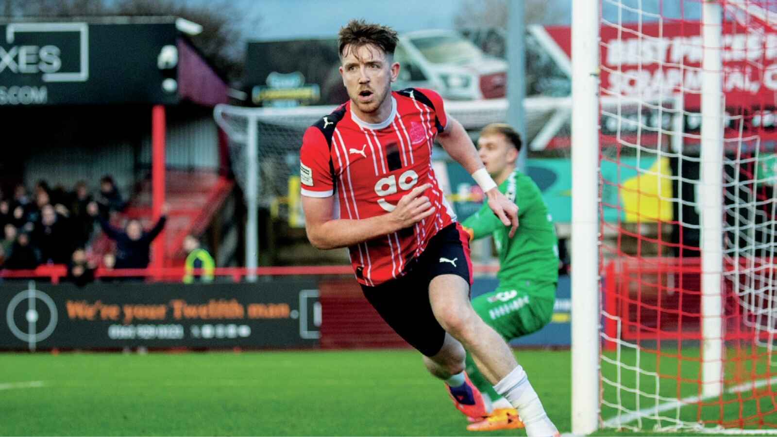 Tom Crawford scores Altrincham's opener PICTURE: Jonathan