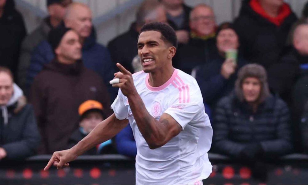 Macclesfield’s Danny Elliott celebrates his penalty to open the scoring against Slough Town in the second round.