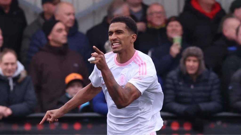 Macclesfield’s Danny Elliott celebrates his penalty to open the scoring against Slough Town in the second round.