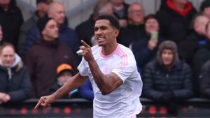 Macclesfield’s Danny Elliott celebrates his penalty to open the scoring against Slough Town in the second round.