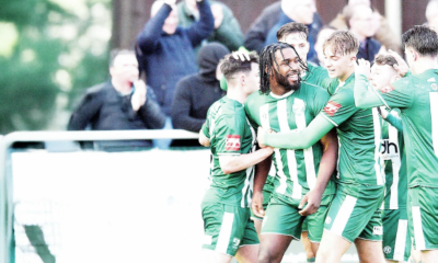 GREEN FOR GO: Niran Butler leads the celebrations after scoring Leatherhead’s second goal PICTURE: Ian Christy