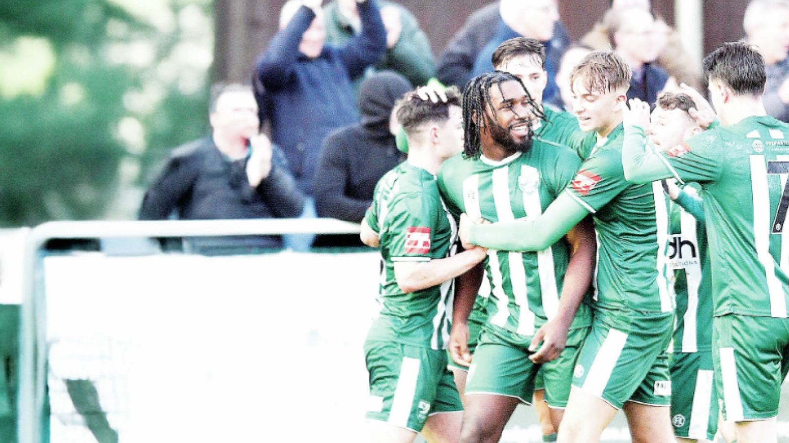 GREEN FOR GO: Niran Butler leads the celebrations after scoring Leatherhead’s second goal PICTURE: Ian Christy