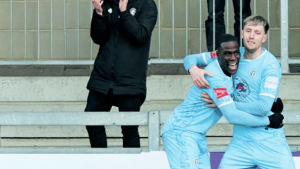 Joe Pigott, right, is congratulated on his opener for Folkestone